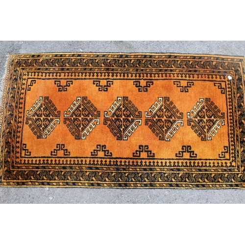 24 - Small Afghan gold ground rug, 138 x 76cm together with a small Afghan prayer rug