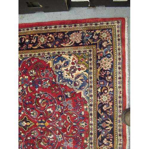 4 - Modern Kashan rug, with all-over floral design on red ground with borders