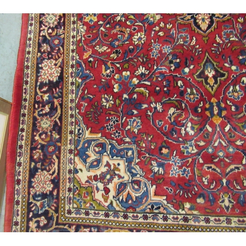 4 - Modern Kashan rug, with all-over floral design on red ground with borders