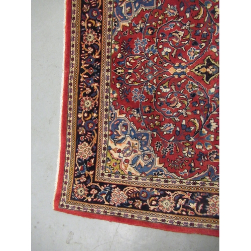 4 - Modern Kashan rug, with all-over floral design on red ground with borders