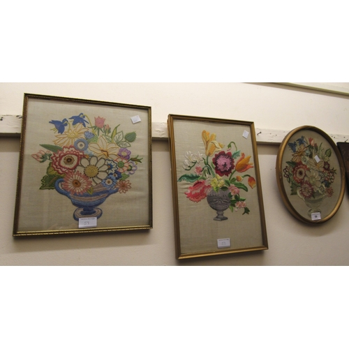 59 - Oval gilt framed floral silkwork picture, together with two other similar rectangular pictures