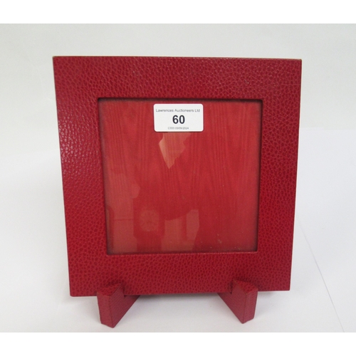 60 - Smythson of Bond Street, red leather square photograph frame on stand, 19cm square