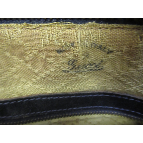 63 - Gucci, crossbody leather and cloth bag, with dust cover, another Gucci handbag (at fault), ladies Gu... 