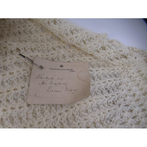 68 - Woollen shawl labelled Marlborough House SW1, inscribed ' Worked by Her Majesty Queen Mary '