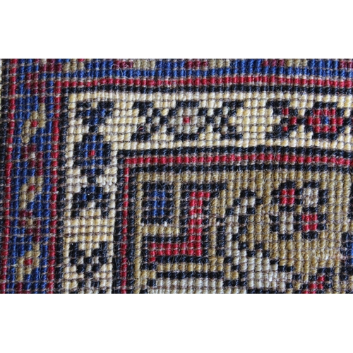 8 - Turkish prayer rug with central mihrab with multiple borders in muted colours, 195 x 117cm