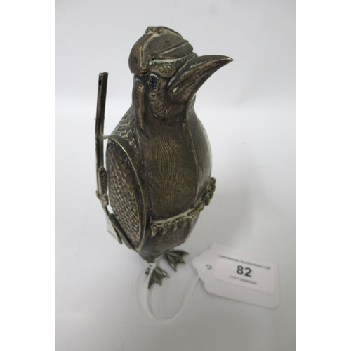 82 - Unusual silver plated German figure of a penguin holding a rifle with jewel inset eyes, circa 1900, ... 