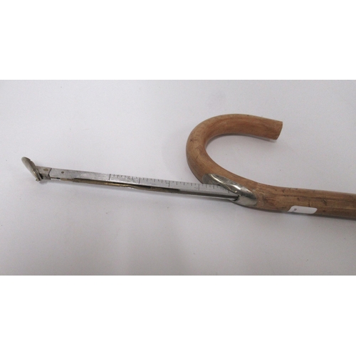 88 - Late 20th Century bamboo equestrian measuring walking stick