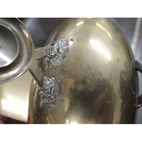 143 - Unusual mid 20th Century silver plated teapot in the form of a twin propellor aeroplane, 29cm long, ... 