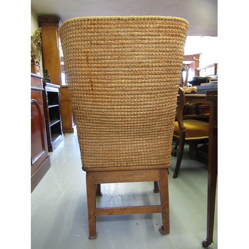 1715 - Orkney oak and seagrass chair raised on square tapering supports, circa 1900