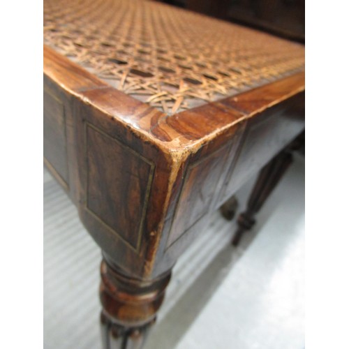 1891 - Pair of Regency simulated rosewood stools, the shaped canework tops above inverted bowl front frieze... 