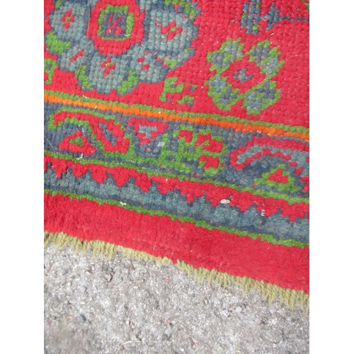 16 - Large Turkish carpet with Ushak design on a red ground with borders, 4m x 3m