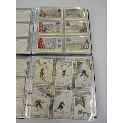 77 - Five albums of Liebig trading cards, mainly later sets