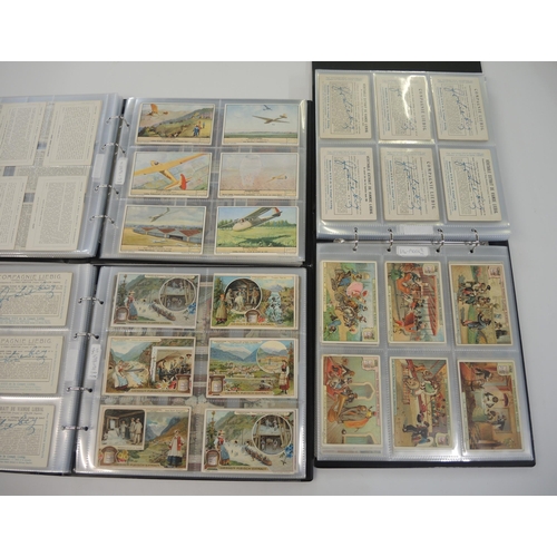 77 - Five albums of Liebig trading cards, mainly later sets