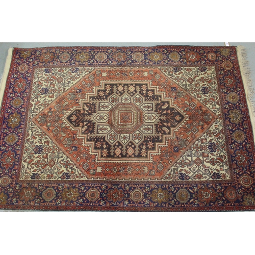 13 - Modern Gholtogh type rug with a medallion and all-over stylised design with corner designs and borde... 