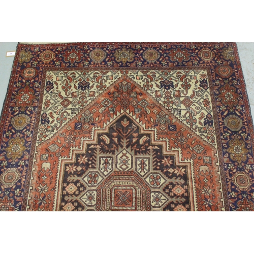 13 - Modern Gholtogh type rug with a medallion and all-over stylised design with corner designs and borde... 