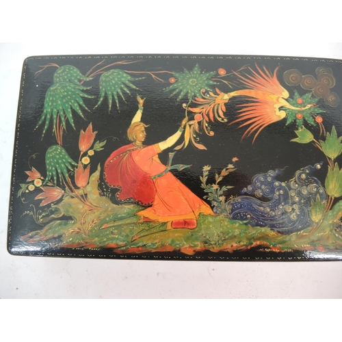 143 - 20th Century Russian lacquer box, the hinged cover painted with a mythological scene, 20cm wide, tog... 