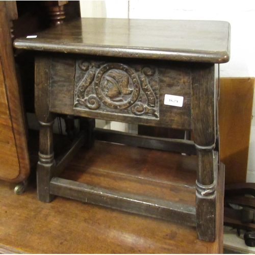 1629 - Reproduction oak box stool, with a hinged lid above a carved front