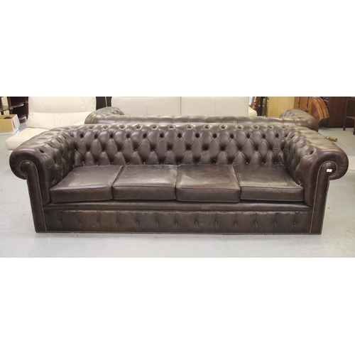 1635 - Large dark tan buttoned leather upholstered Chesterfield settee, 255cm wide