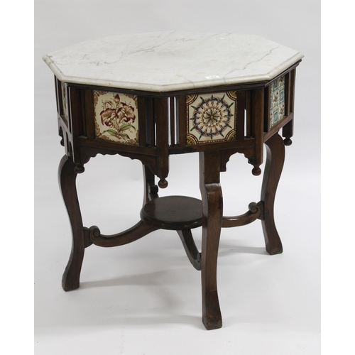 1664 - Unusual Arts & Crafts octagonal centre table with marble top above a tile inset freize, raised on ca... 