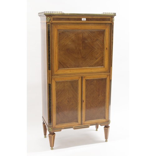 Gillows of Lancaster, fine figured mahogany satinwood crossbanded coromandel and rosewood inlaid side cabinet, the brass galleried top above a single panel door and pair of rectangular panel doors enclosing a shelved interior, the canted corners with ormolu roundel mounts, raised on square tapering moulded supports terminating in brass ball feet, stamped Gillows of Lancaster and numbered 24933 to the rear panel, 133cm x 70cm