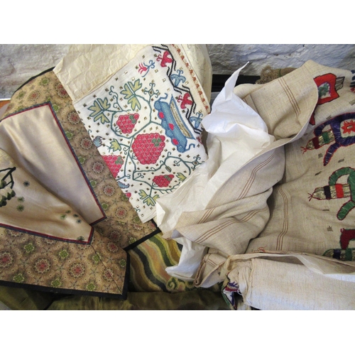 20 - Two boxes containing a quantity of miscellaneous oriental textiles