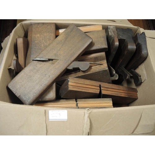 228 - Collection of various antique woodworking planes, together with a large trunk containing a quantity ... 