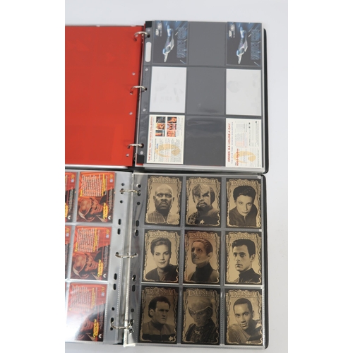 285 - Five albums containing various Star Trek trading card sets by Skybox, including some autograph cards