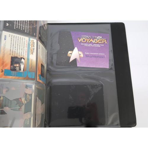 285 - Five albums containing various Star Trek trading card sets by Skybox, including some autograph cards