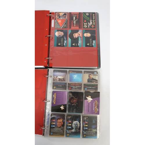 285 - Five albums containing various Star Trek trading card sets by Skybox, including some autograph cards