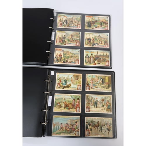 286 - Five albums of Liebig trading cards containing various complete sets