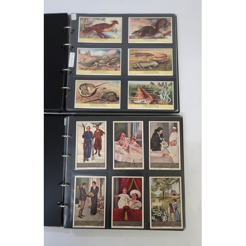 287 - Five albums of Liebig trading cards containing various complete sets