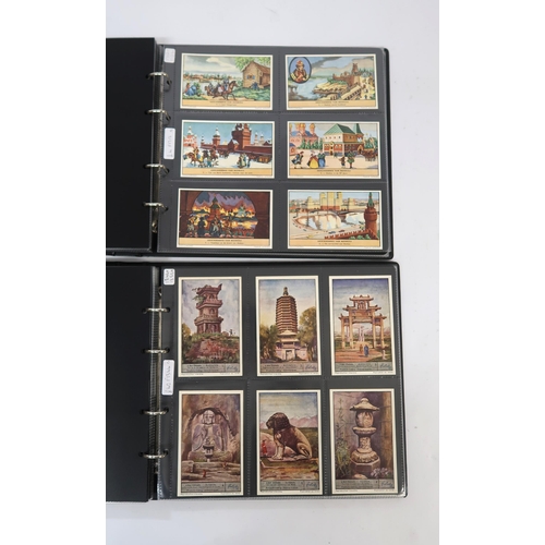 287 - Five albums of Liebig trading cards containing various complete sets