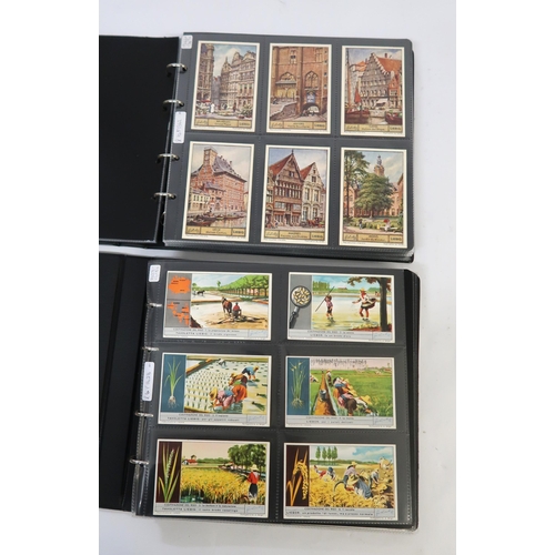 287 - Five albums of Liebig trading cards containing various complete sets