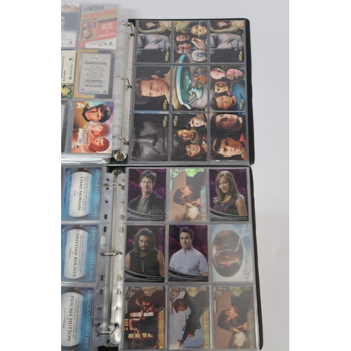 288 - Five albums containing Babylon 5, Stargate Atlantis, and Farscape trading cards, including some auto... 