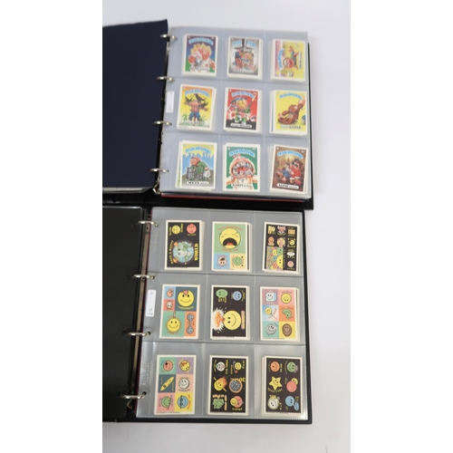 297 - Five albums of Topps trading cards, including A-Team, Dracula, New Kids on the Block, Neighbours etc... 