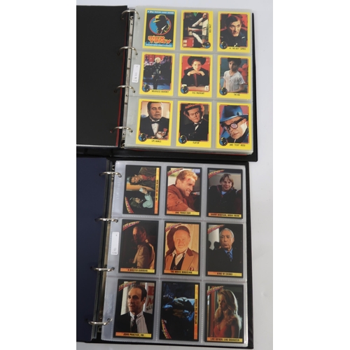 299 - Five albums of Topps trading cards, including Twighlight, Flintstones, Last Action Hero etc.