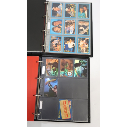 299 - Five albums of Topps trading cards, including Twighlight, Flintstones, Last Action Hero etc.