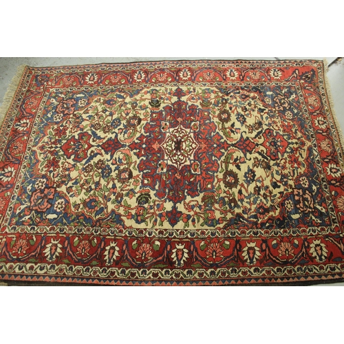 3 - Bakhtiari rug with a lobed medallion and all-over floral stylised design on a beige ground with bord... 