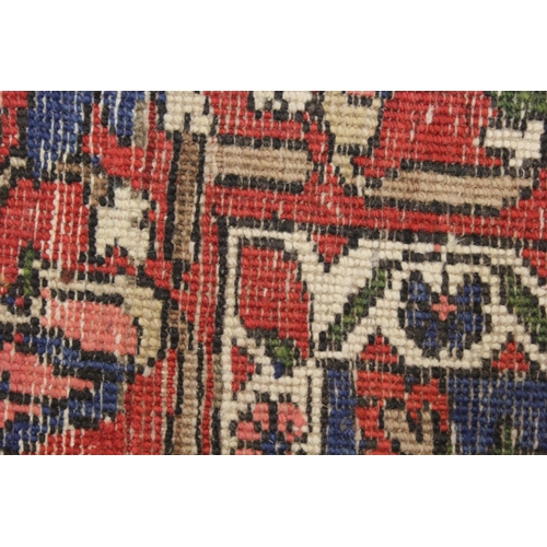 3 - Bakhtiari rug with a lobed medallion and all-over floral stylised design on a beige ground with bord... 