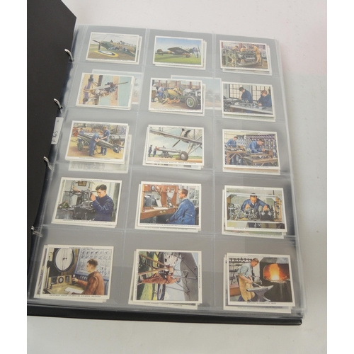 312 - One album of Churchman cigarette cards, including Lawn Tennis, World Wonders etc.