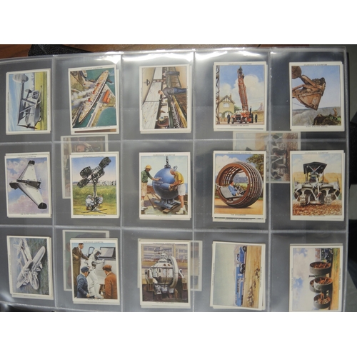 312 - One album of Churchman cigarette cards, including Lawn Tennis, World Wonders etc.