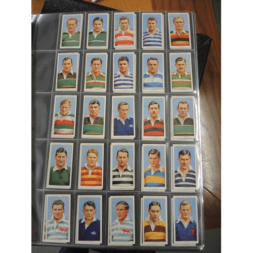 312 - One album of Churchman cigarette cards, including Lawn Tennis, World Wonders etc.