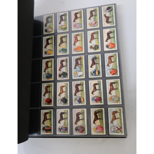 313 - One album of Ogden's cigarette cards, including Jockeys, Pugilists sets etc.