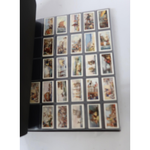 313 - One album of Ogden's cigarette cards, including Jockeys, Pugilists sets etc.