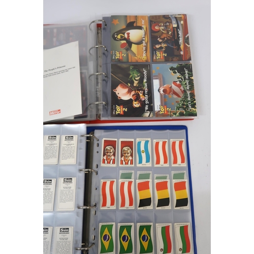 318 - Four albums of Sun Soccer cards