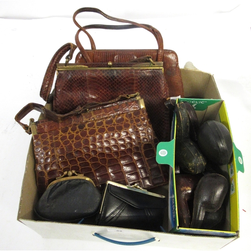 32 - Three various mid 20th Century ladies embossed leather handbags and two purses, together with a quan... 