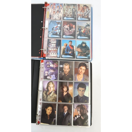 320 - Five albums of trading cards, including Sandman, Justice League, 24, Lost in Space etc.