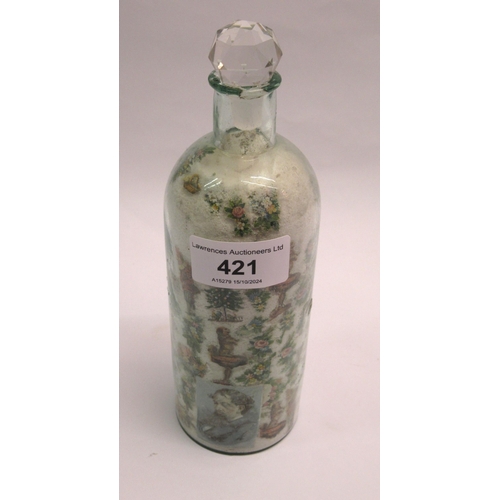 421 - Victorian Decalomania glass bottle with associated stopper, 19cm high