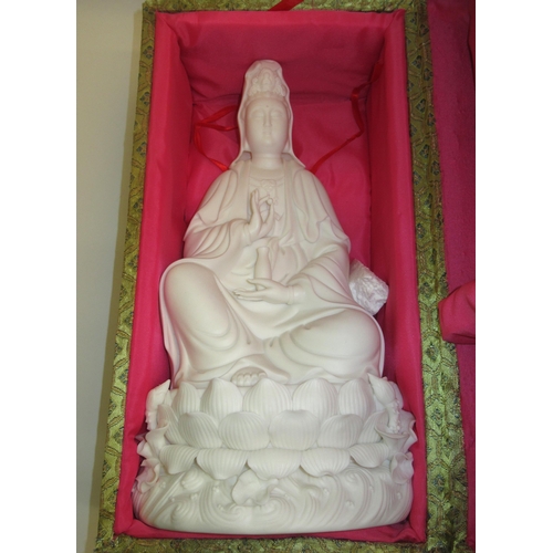 429 - Modern Chinese bisque figure of a seated Goddess, 36cm high, in original silk covered box