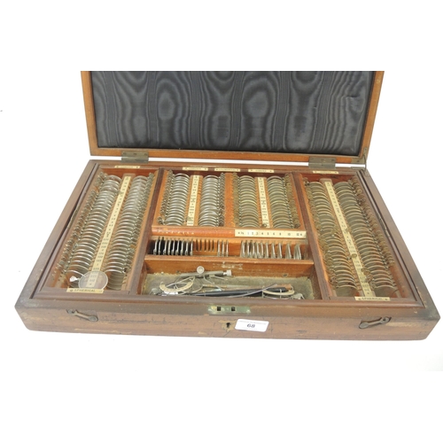 68 - 19th Century mahogany cased opticians eye testing set. No key present.